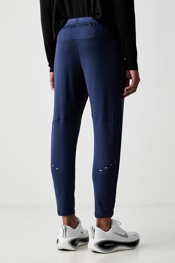 Odzież Nike spodnie treningowe męskie Stride HV4546.410 granatowy