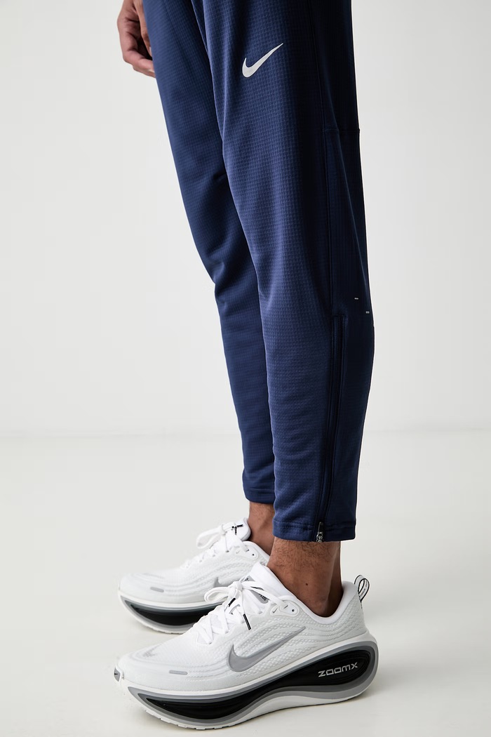 Nike spodnie treningowe męskie Stride granatowy HV4546.410