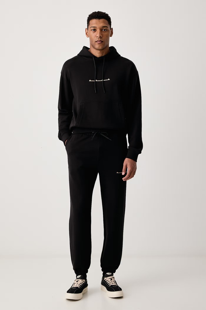 HUGO Spodnie dresowe męskie bawełniane Datripant 50568125 czarny AW26