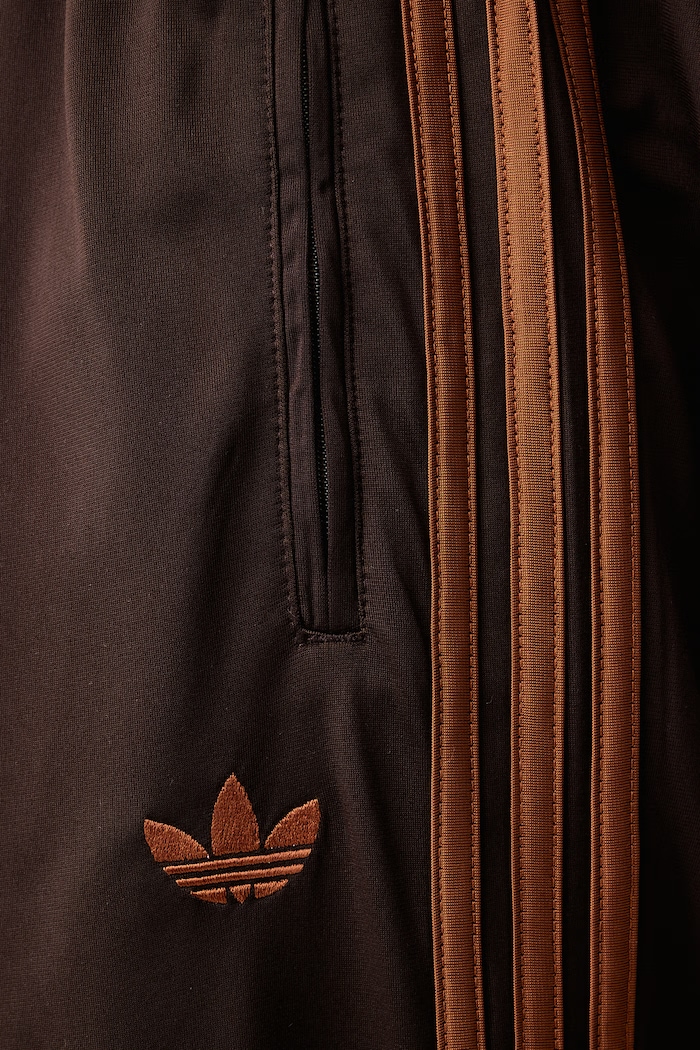 Spodnie dresowe męskie Firebird adidas Originals brązowy KS7477