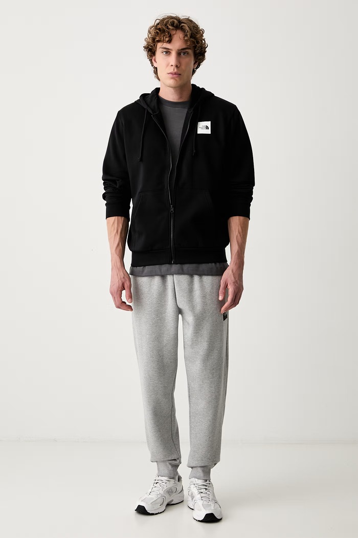 The North Face spodnie dresowe męskie z bawełną NF0A8JB0CQO1 szary AW26