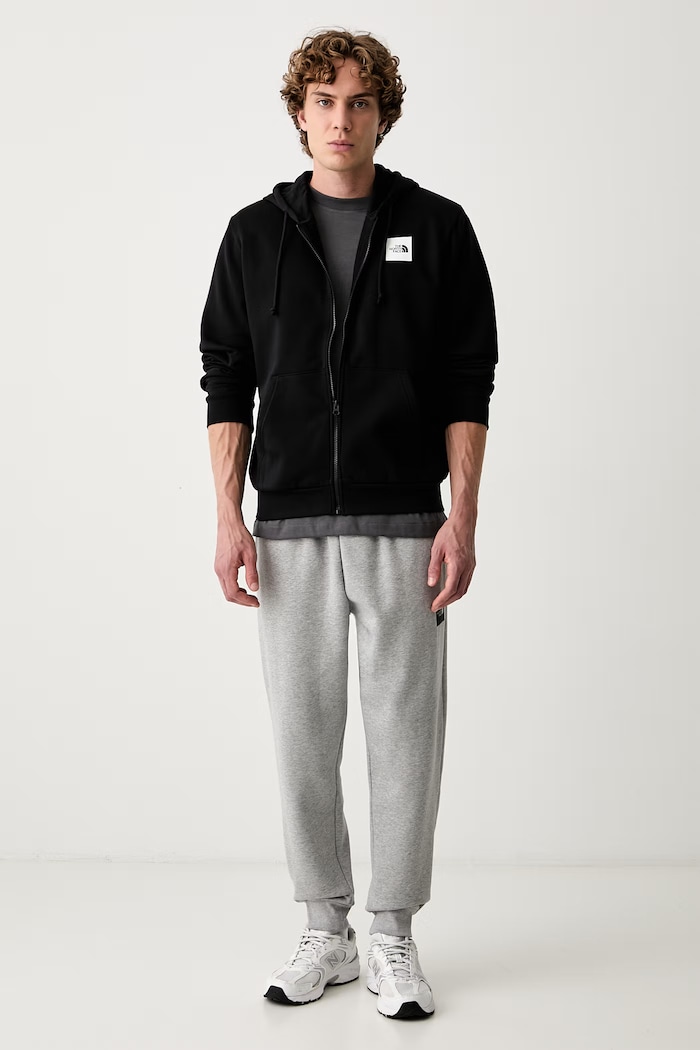 The North Face spodnie dresowe męskie z bawełną NF0A8JB0CQO1 szary AW26