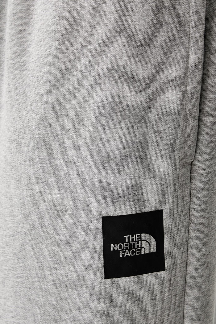 The North Face spodnie dresowe męskie z bawełną szary NF0A8JB0CQO1