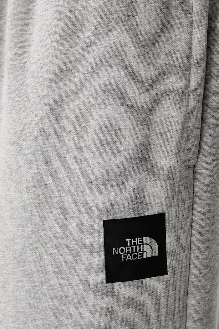 The North Face spodnie dresowe męskie z bawełną szary NF0A8JB0CQO1