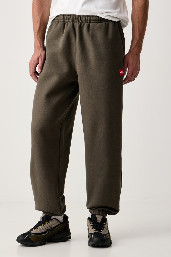 The North Face Spodnie dresowe męskie z bawełną RedBox zielony NF0A8EG321L1