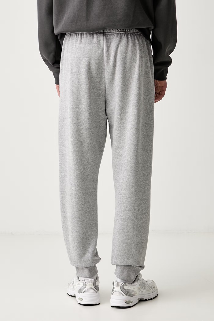 Odzież The North Face spodnie dresowe męskie z bawełną Evolution NF0A8CWYCQO1 szary