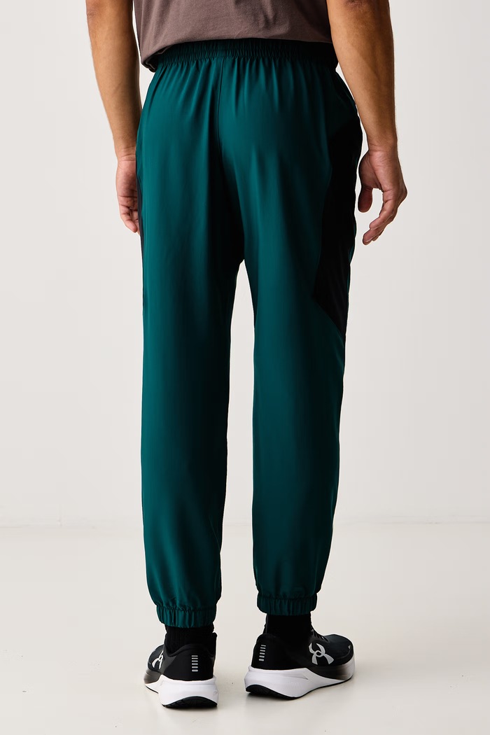 Odzież Under Armour Spodnie treningowe męskie Tech Sport 6011268.919 zielony