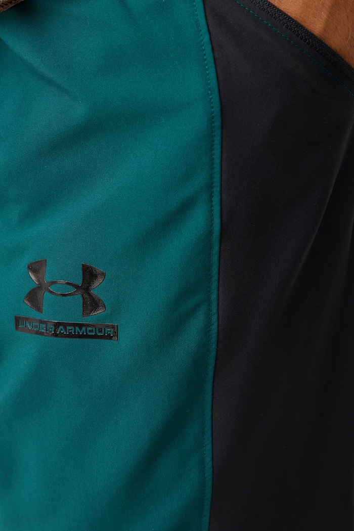 Spodnie treningowe męskie Tech Sport Under Armour 6011268.919 zielony