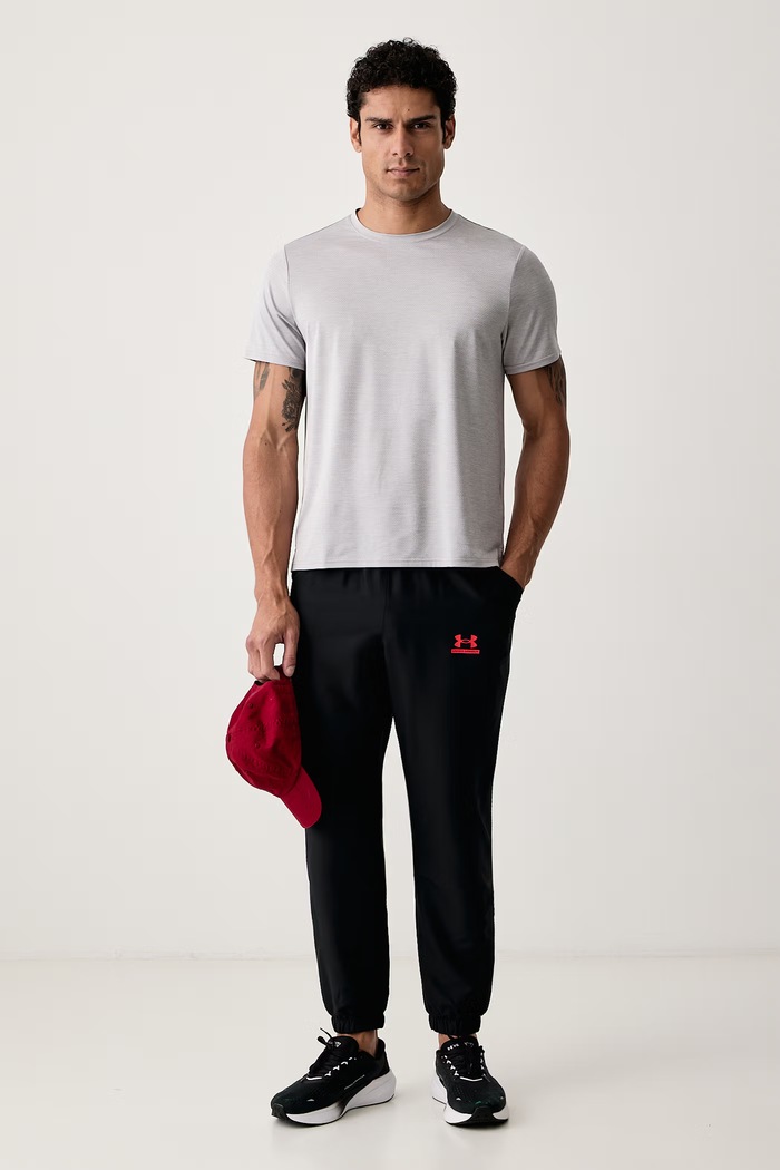 Under Armour Spodnie treningowe męskie Tech Sport 6011268.002 czarny AW26