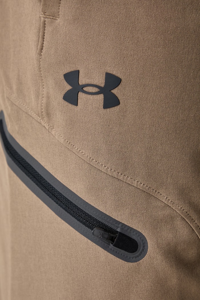 Spodnie dresowe męskie Unstoppable Under Armour 1390256.219 zielony