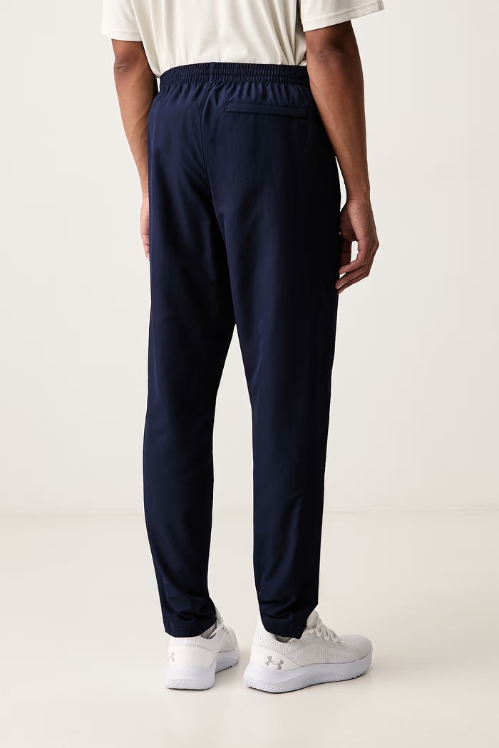 Odzież Under Armour Spodnie dresowe męskie 1390150.410 granatowy