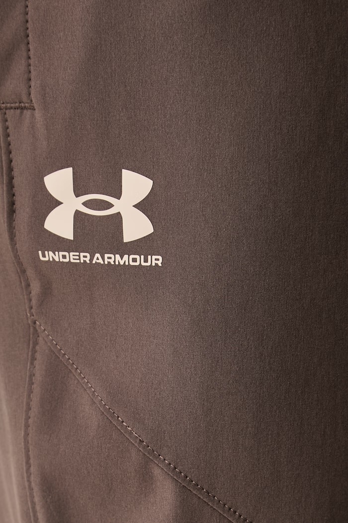 Under Armour spodnie dresowe męskie Vibe Woven brązowy 1386557.200