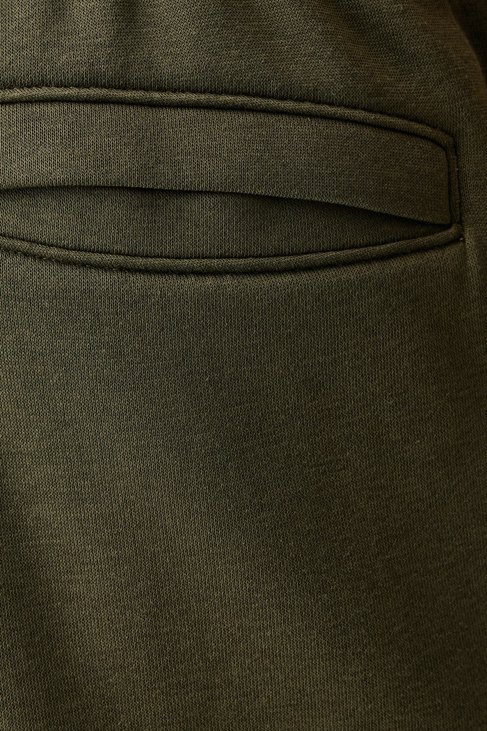 Spodnie dresowe męskie z bawełną Rival Under Armour zielony 6017021