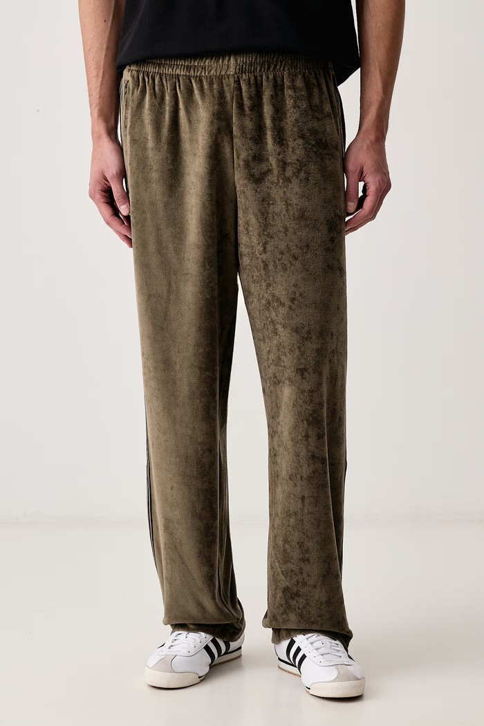 adidas Originals Spodnie dresowe męskie Firebird Velour zielony KE4165