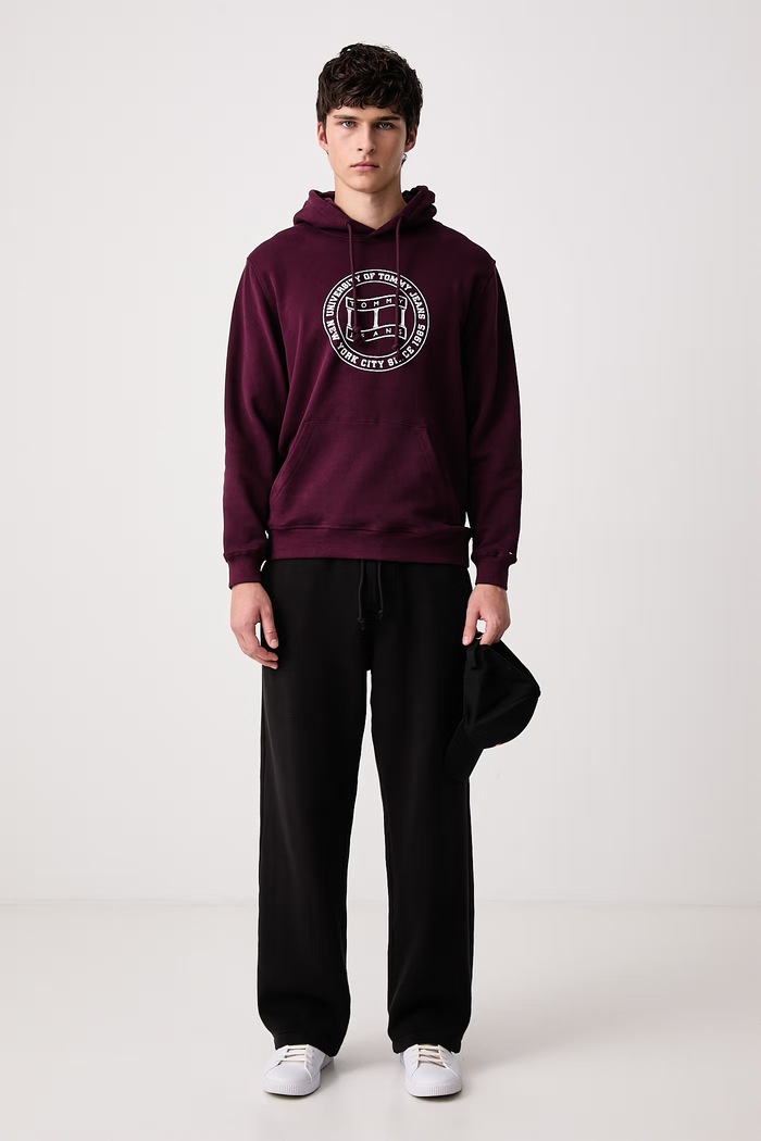 Tommy Jeans Tepláky pánské s bavlnou DM0DM23729 černá AW26