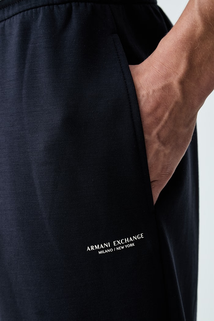 Armani Exchange spodnie dresowe męskie z modalem granatowy XM002941.AF19936