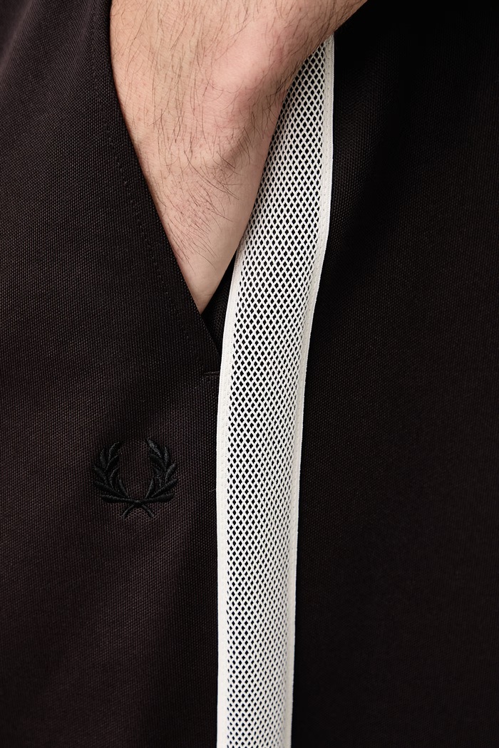 Spodnie dresowe męskie Fred Perry brązowy T3303.33C