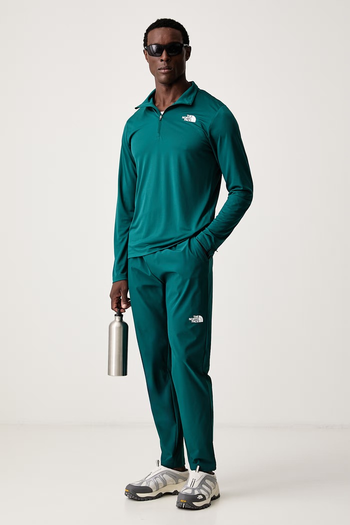 The North Face Παντελόνι προπόνησης Ανδρικό MOUNTAIN ATHLETICS USHBA NF0A8G8FN4J1 τιρκουάζ AW26