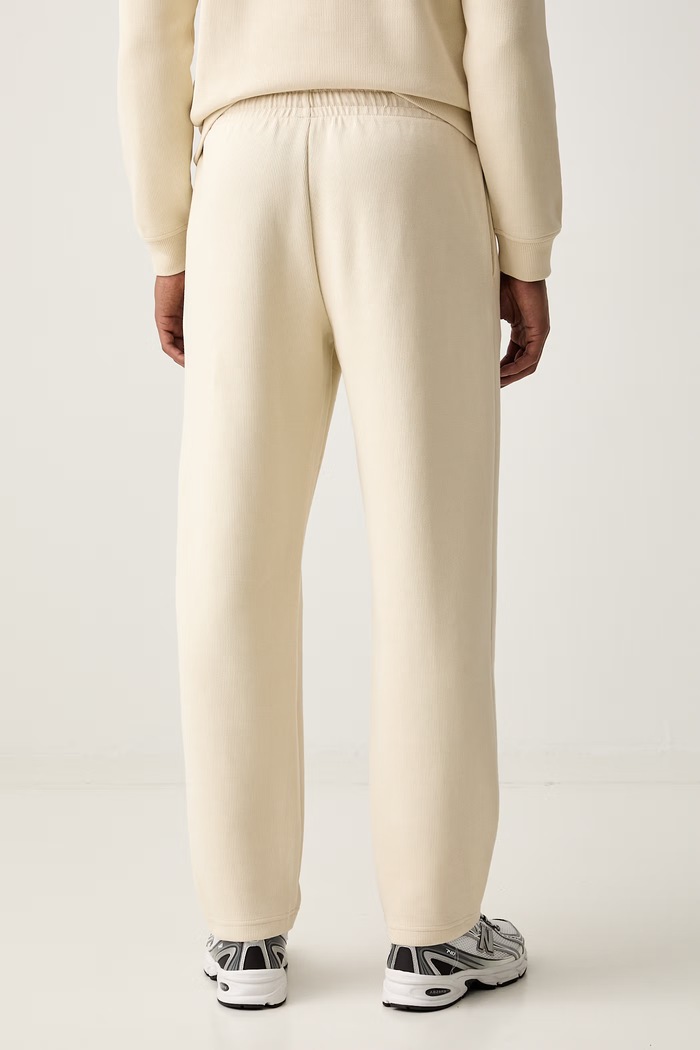 Odzież EA7 Emporio Armani spodnie dresowe męskie bawełniane AF21822.7M002235 beżowy