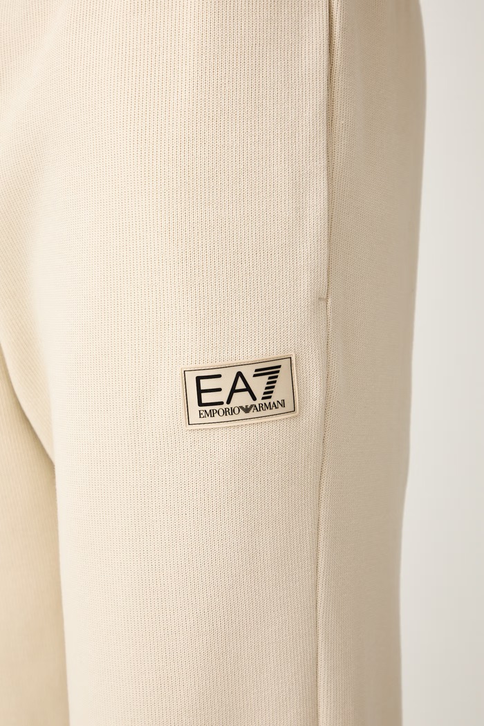 EA7 Emporio Armani spodnie dresowe męskie bawełniane beżowy AF21822.7M002235