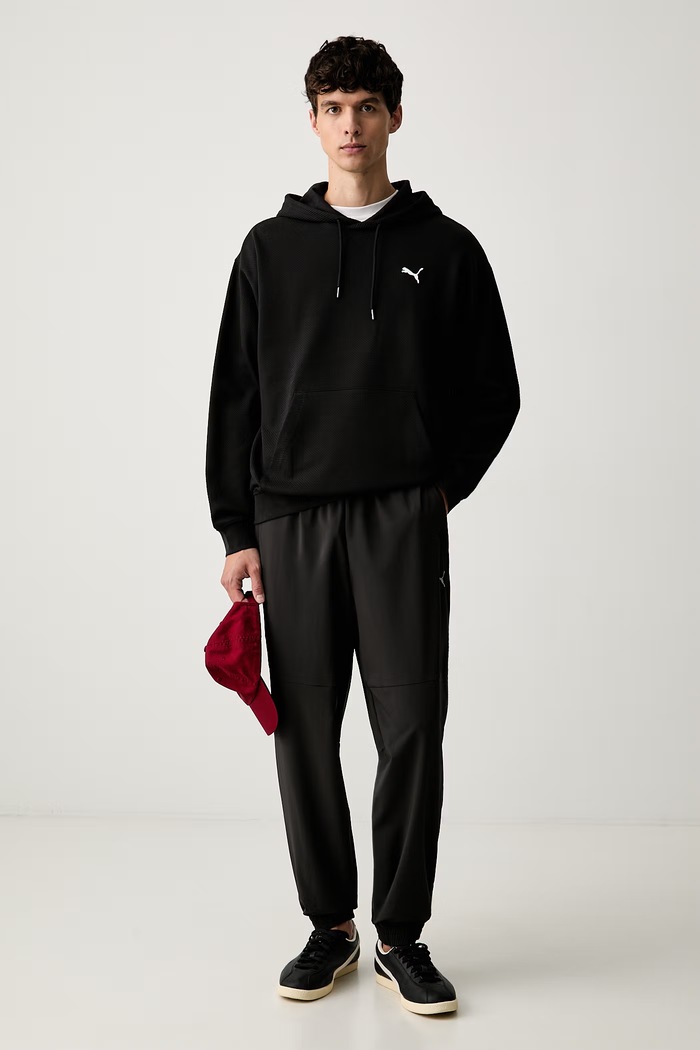 Puma spodnie dresowe męskie PUMATECH 693954 czarny AW26