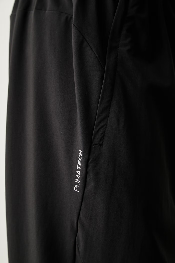 Puma spodnie dresowe męskie PUMATECH 693954 czarny