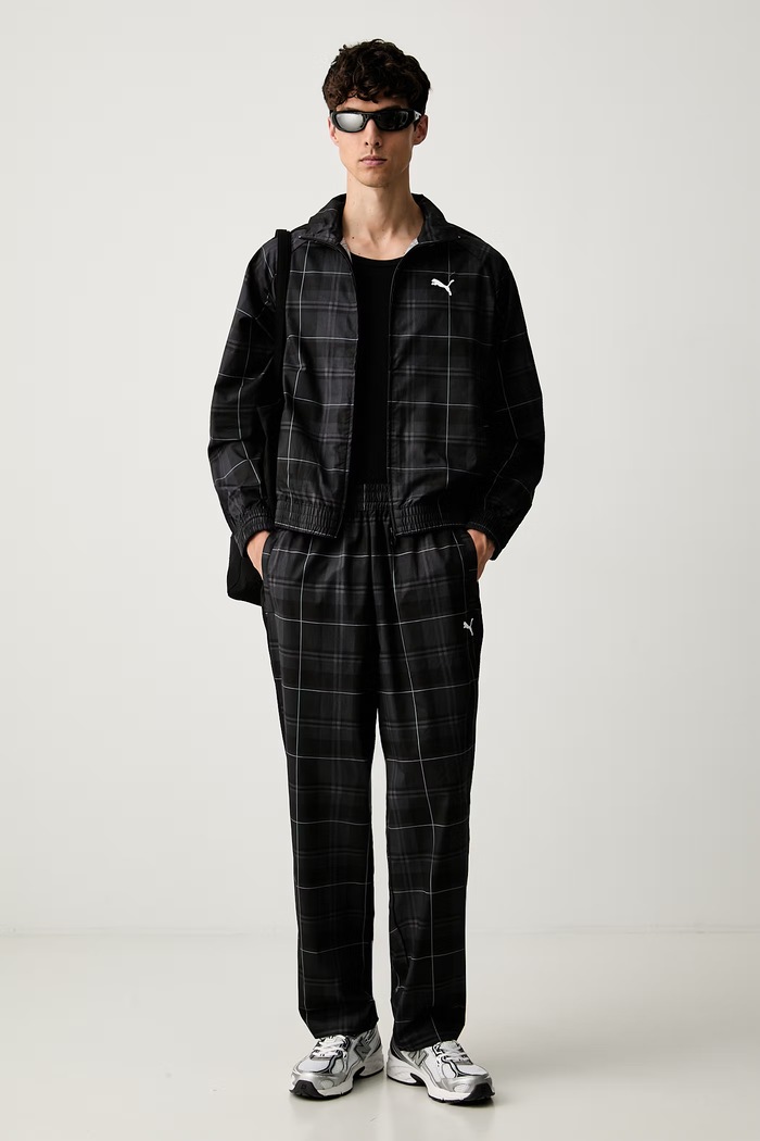 Puma spodnie męskie bawełniane T7 636732 czarny AW26