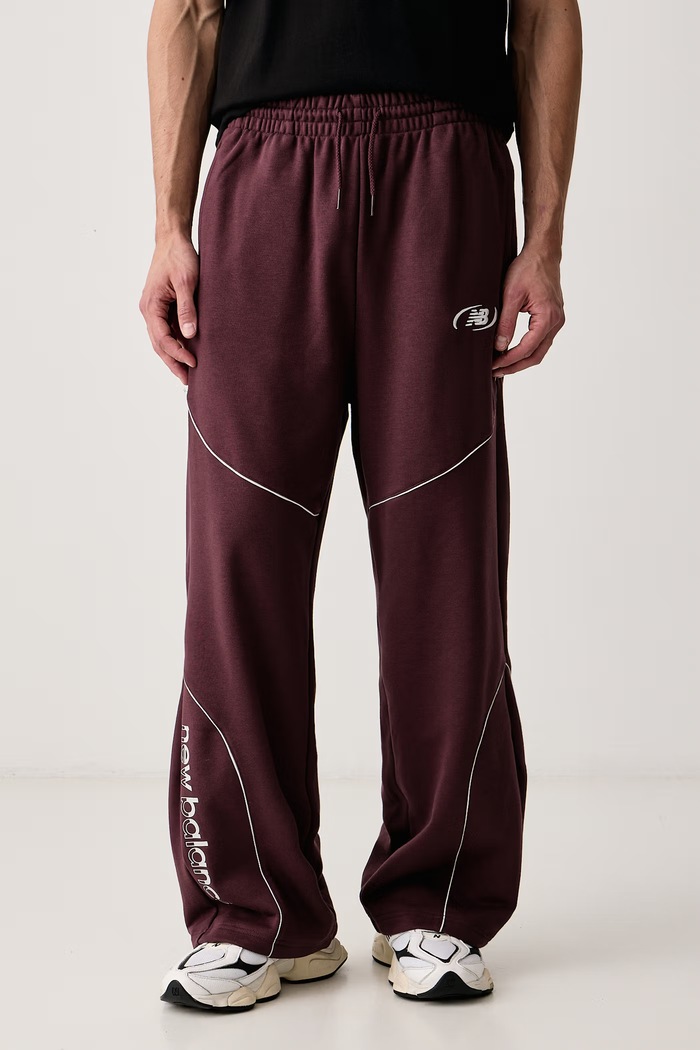 New Balance Spodnie dresowe męskie z bawełną bordowy MB62053FYLR