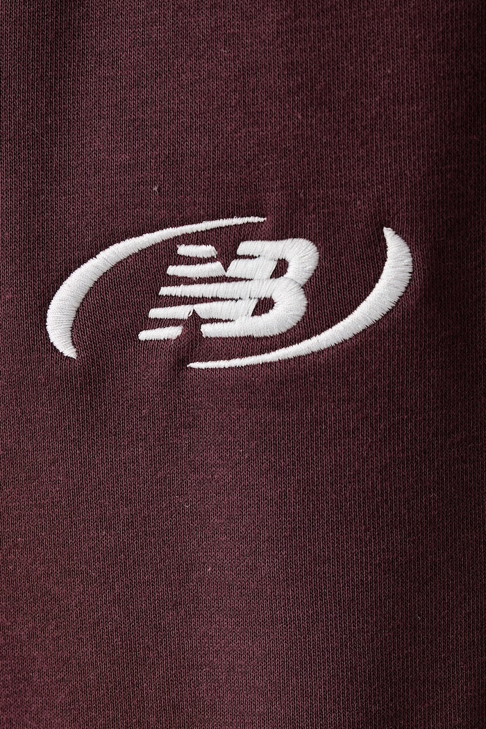 Spodnie dresowe męskie z bawełną New Balance MB62053FYLR bordowy