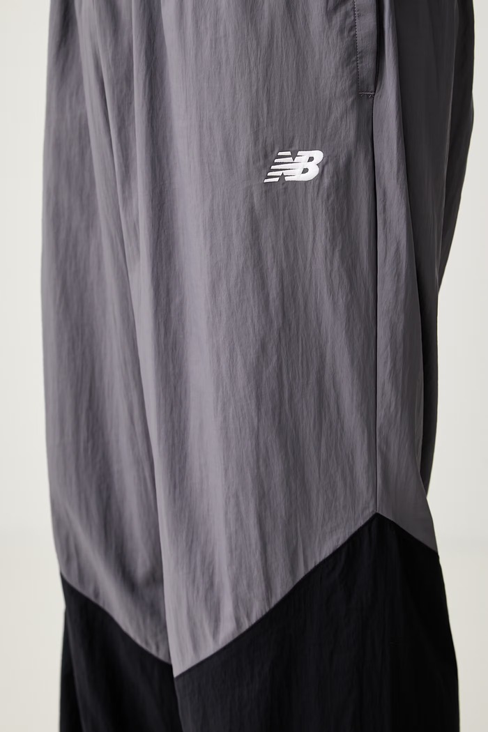 New Balance spodnie dresowe męskie fioletowy MB61R010AA9
