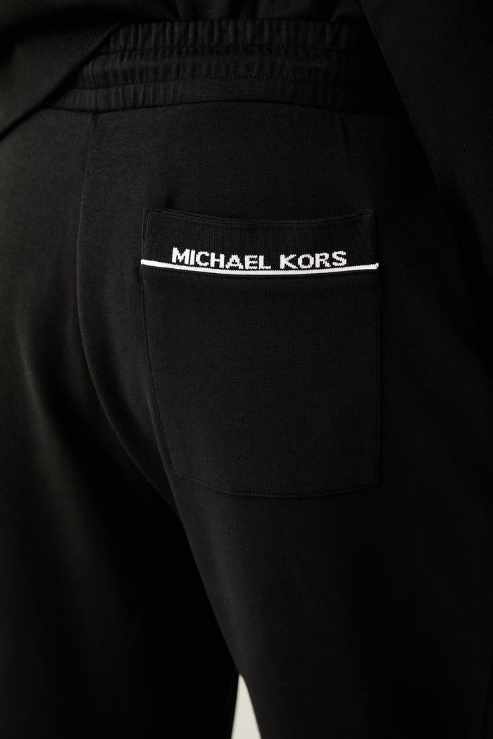 Michael Kors spodnie dresowe męskie bawełniane z elastanem czarny CT6532D5MF