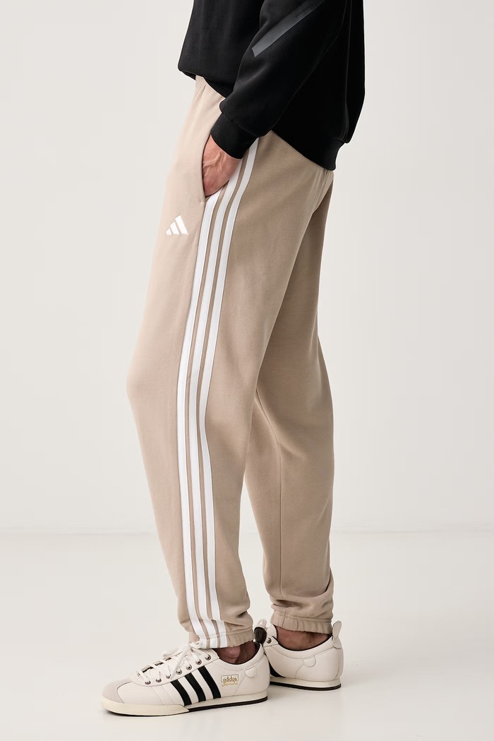 Spodnie dresowe męskie bawełniane Essentials adidas KY4196 beżowy