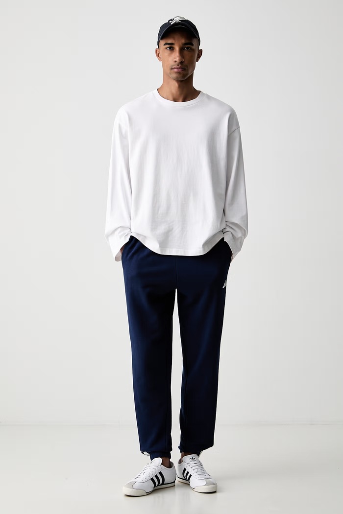 adidas spodnie dresowe męskie bawełniane Essentials KY4197 granatowy AW26