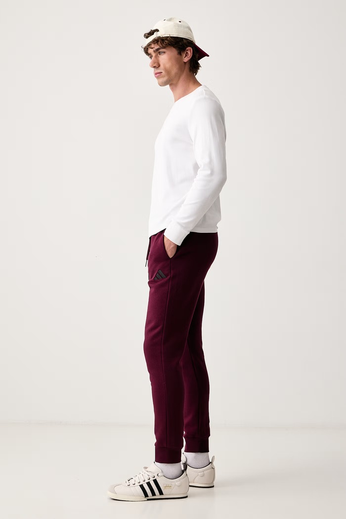 adidas Παντελόνι επίσημο ανδρικό με βαμβάκι Essentials Feelcozy KF2382 μπορντό AW26