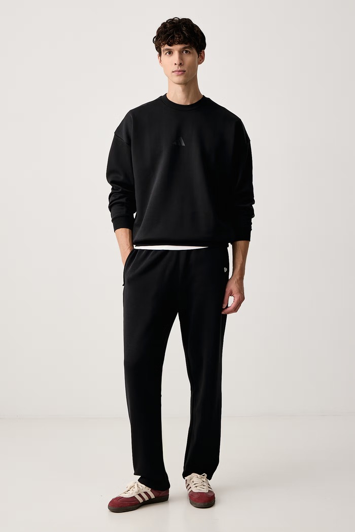 New Era Spodnie dresowe z bawełną 60897408 czarny AW26
