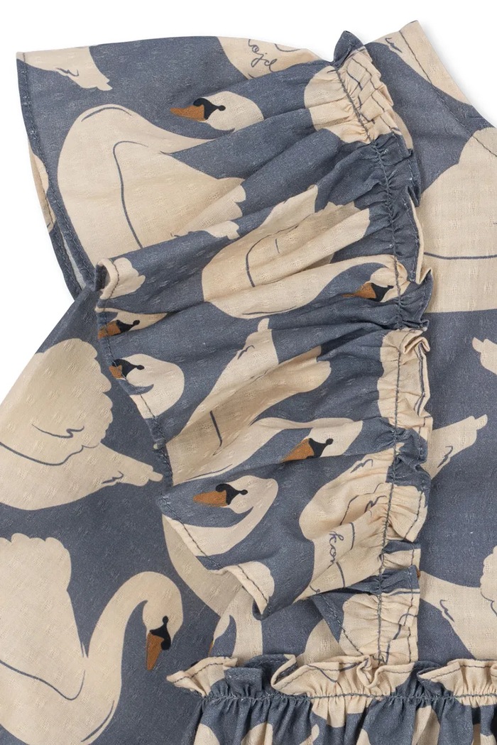 Konges Sløjd Sukienka rozkloszowana bawełniana EVIA LS BOW DRESS GOTS KS105988.9BY2 niebieski AW26