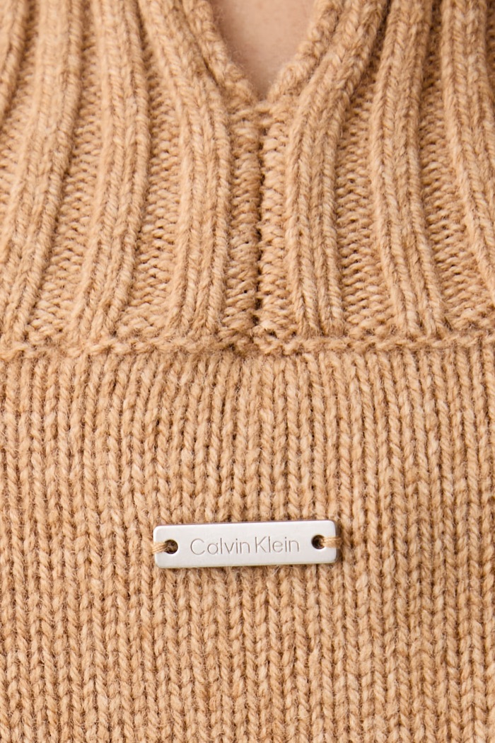 Sweter damski wełniany Calvin Klein beżowy LV044H326G