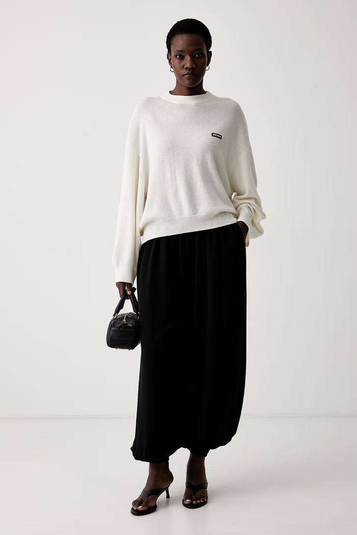 Rotate sweter damski wełniany 116612857 beżowy AW26