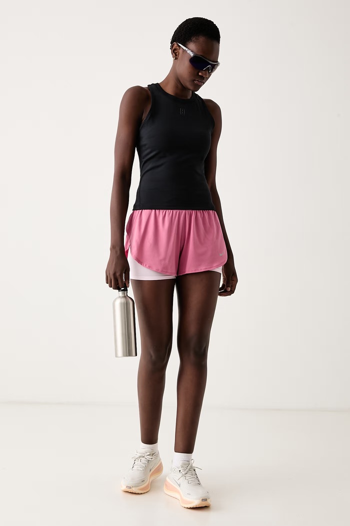 Nike Pantaloncini sportivi da donna Tempo Flow 2in1 IF7518.641 rosa AW26