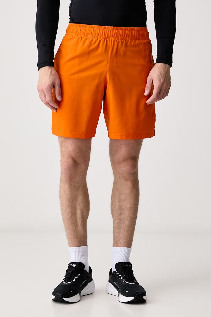 Under Armour Szorty sportowe męskie Vanish Woven pomarańczowy 1383356.808