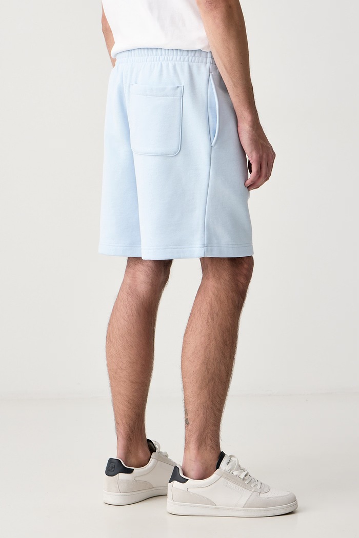 Odzież Lacoste Szorty dresowe męskie z bawełną GH8861 niebieski