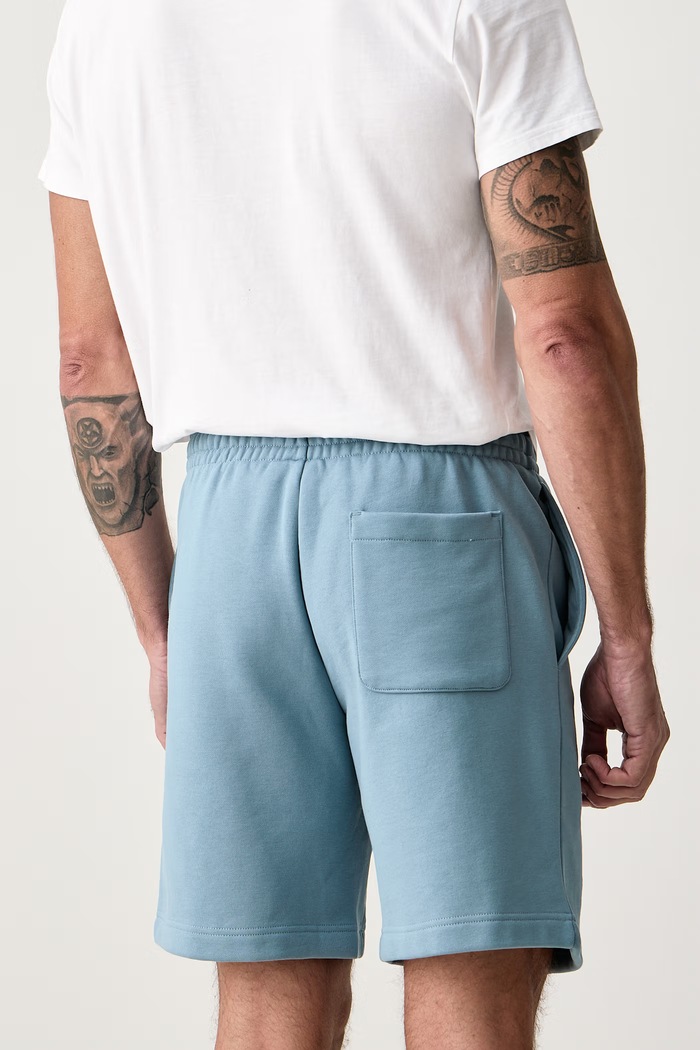 Odzież Lacoste Szorty dresowe męskie z bawełną GH8861 niebieski