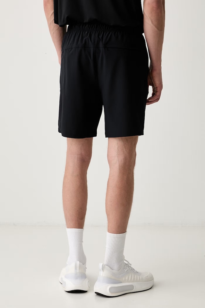 Odzież Skechers szorty męskie PREMIER 7" SHORT SH82 czarny
