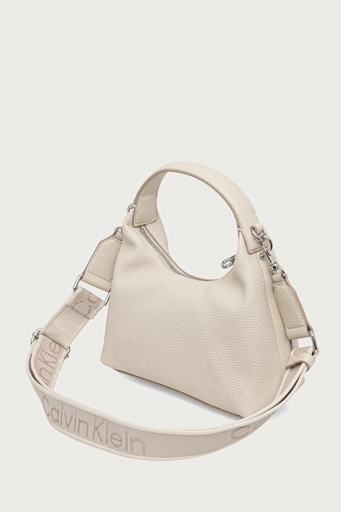Akcesoria Calvin Klein Torebka hobo damska z imitacji skóry LV04F3892G beżowy