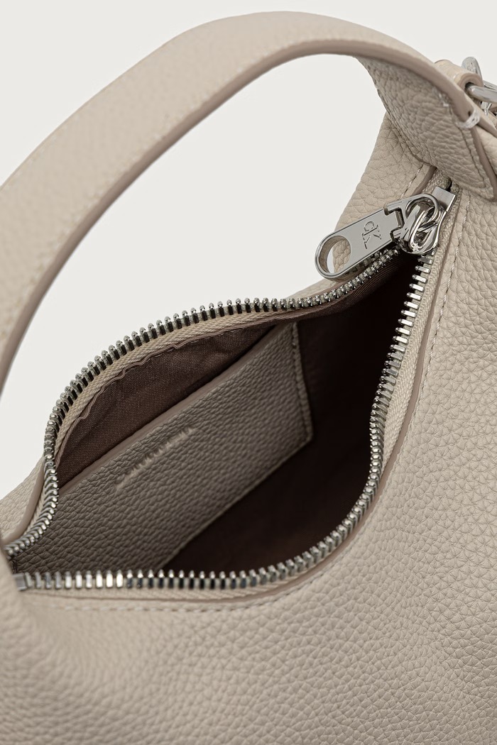 Torebka hobo damska z imitacji skóry Calvin Klein beżowy LV04F3892G