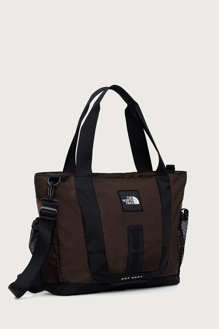 The North Face Kabelka typu tote dámska Hot Shot 23L NF0A8JCF9211 hnedá AW26