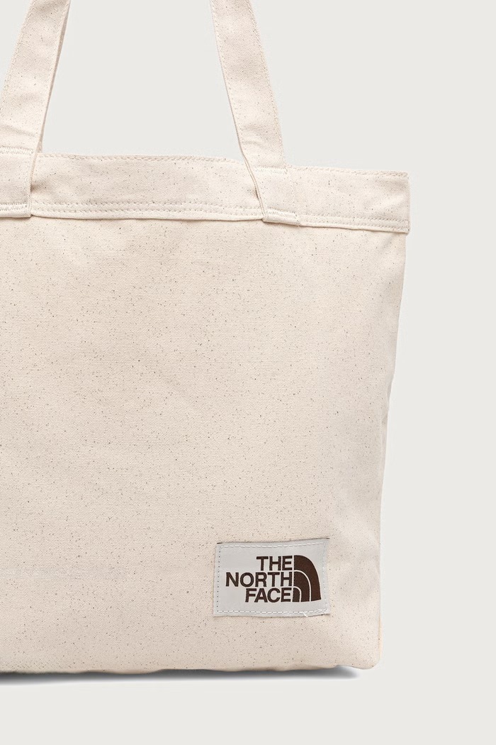 Dodaci The North Face Shopper torba za žene od pamuka Cotton Tote 17L NF0A3VWQ12P1 bež