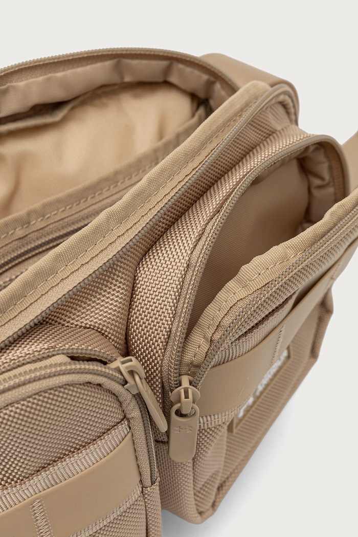 Under Armour τσαντάκι μέσης Triumph 6011286 μπεζ