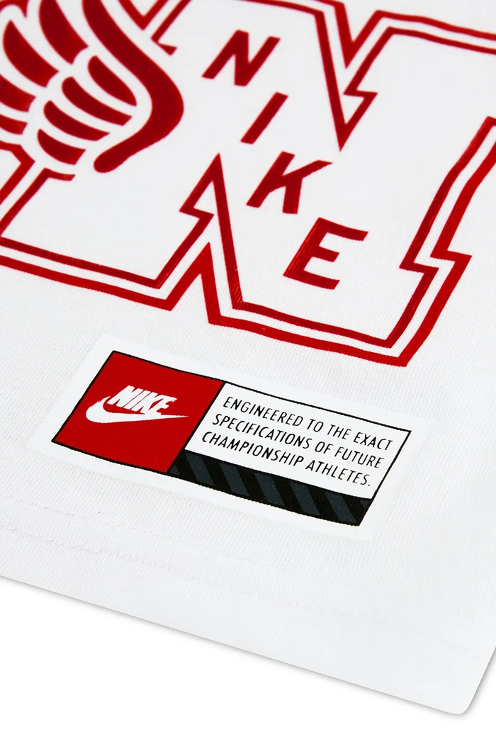 Nike T-shirt dziecięcy z bawełną 86P293 biały AW26