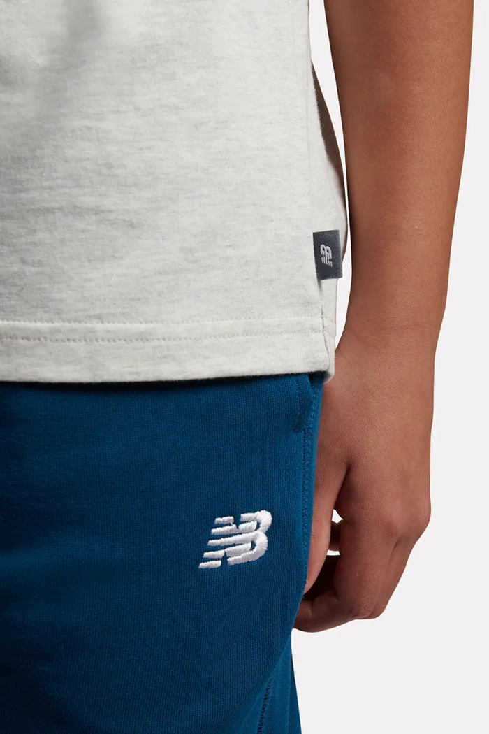 New Balance T-shirt dziecięcy bawełniany YT62H1BR